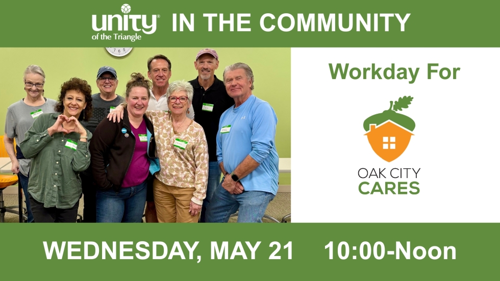 group of 8 people smiling at camera with arms around each other while volunteering at Oak City Cares