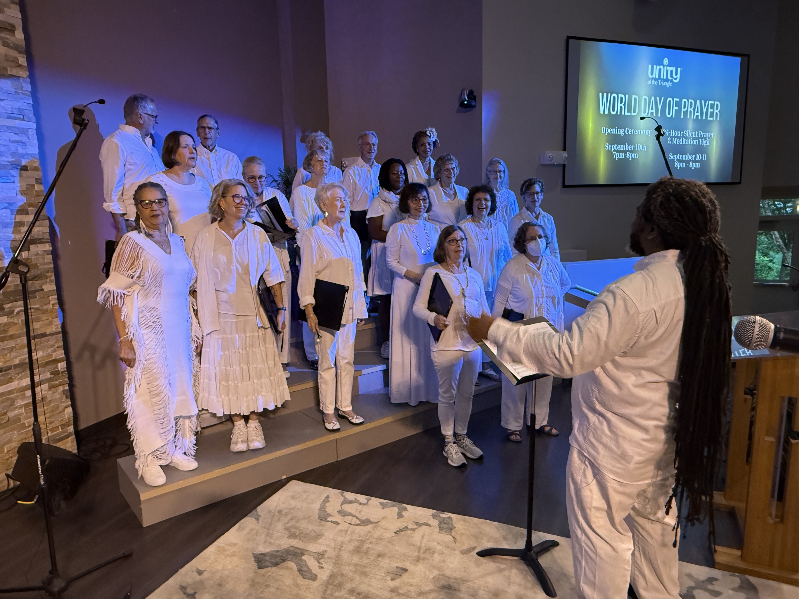 Unity of the Triangle Choir all dressed in white