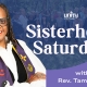Rev Tami Johns wearing white blouse, purple interfait prayer shawl. crowd of women in backgroud with words Sisterhood Saturday, Unity of the Triangle logo