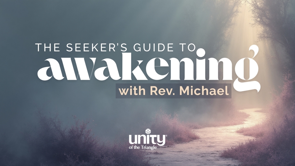 paved path through the woods with sunlight streaming through the trees. text: the spiritual seeker's guide to awakening. unity of the triangle logo