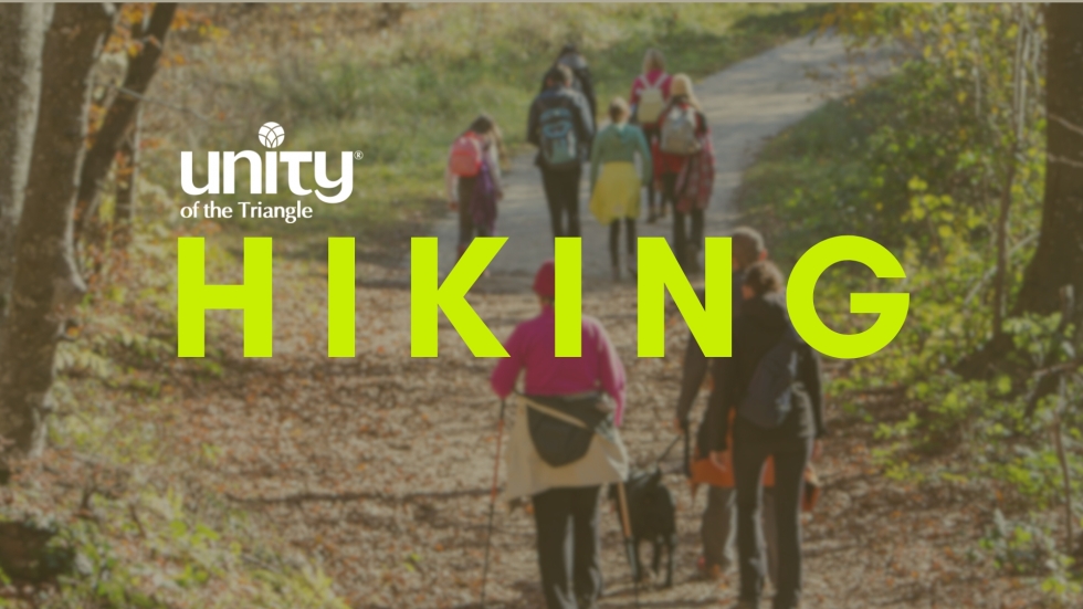 families of hikers on paved path