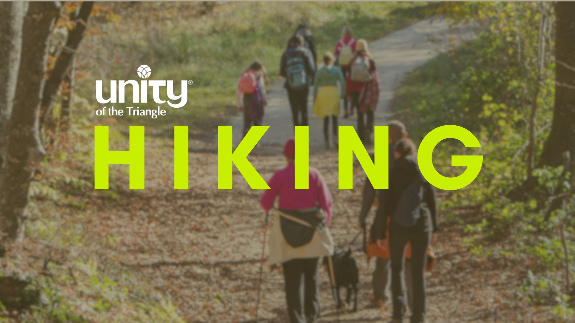 families of hikers on paved path