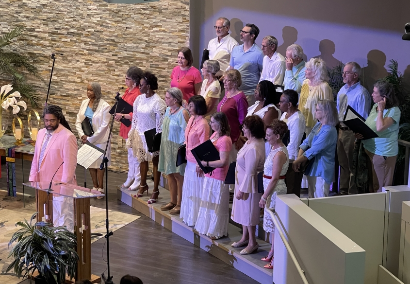 Unity of the Triangle Choir dressed in pastel outfits