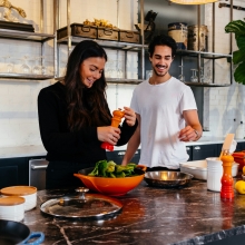 healthy cooking young couple cooking healthy food as part of holistic health