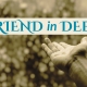 outstretched hand with words Friend in Deed and Unity of hte Triangle logo