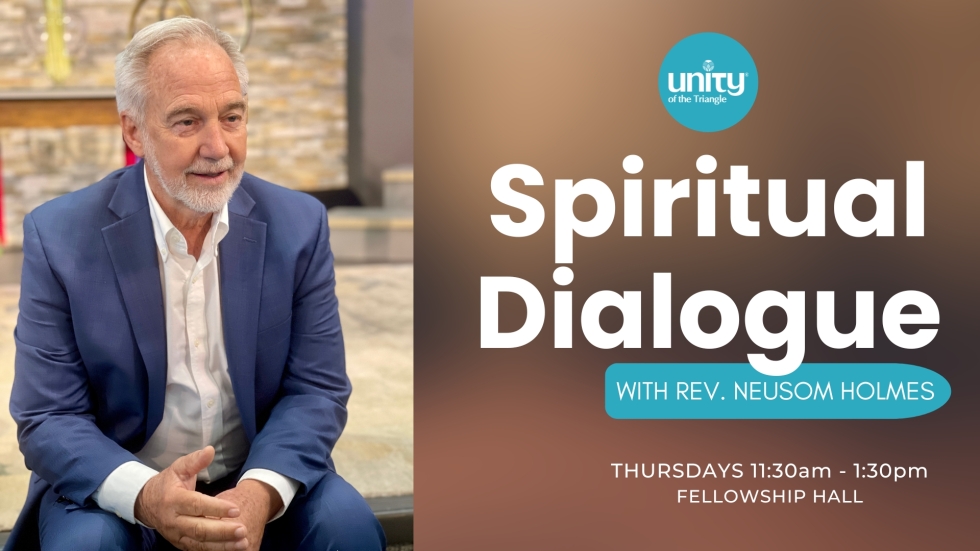 Rev Neusom Holmes in blue suit, white shirt sitting on sanctuary stage steps. Text: Spiritual Dialogue Thursdays 11:30 at Unity of the Triangle.